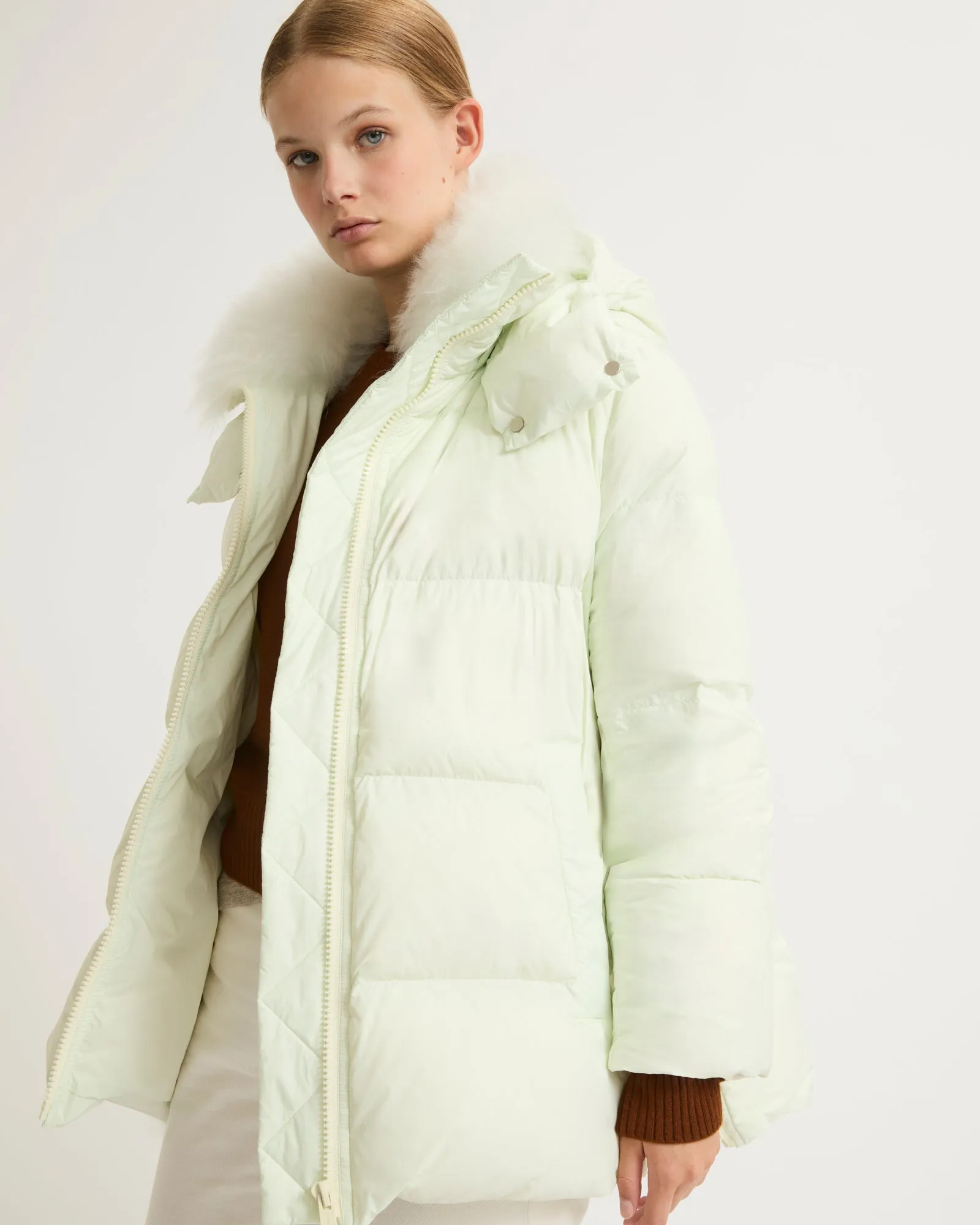 Iconic "A" line down jacket with lambswool collar