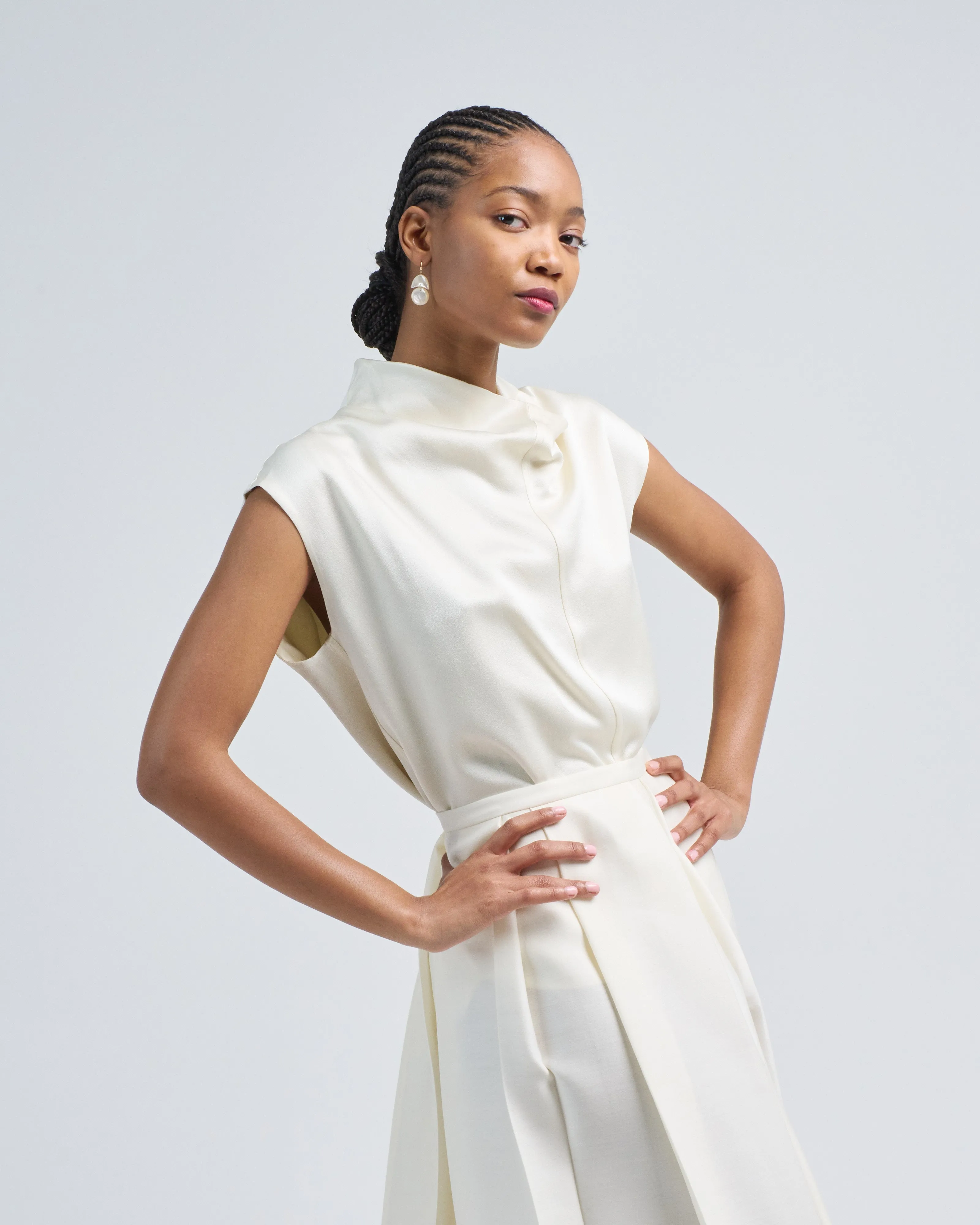 sleeveless funnel-neck top