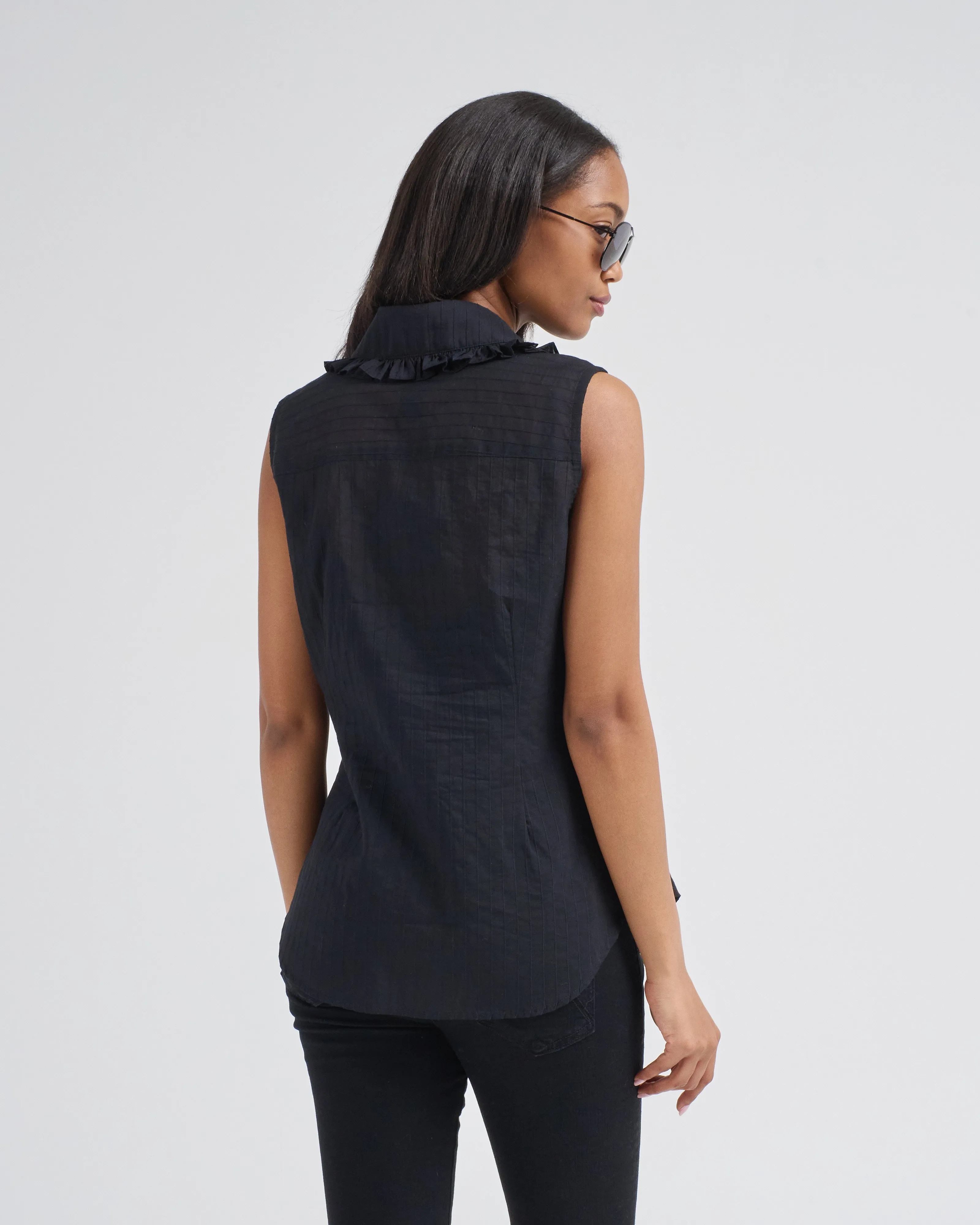 sleeveless ruffle trim shirt