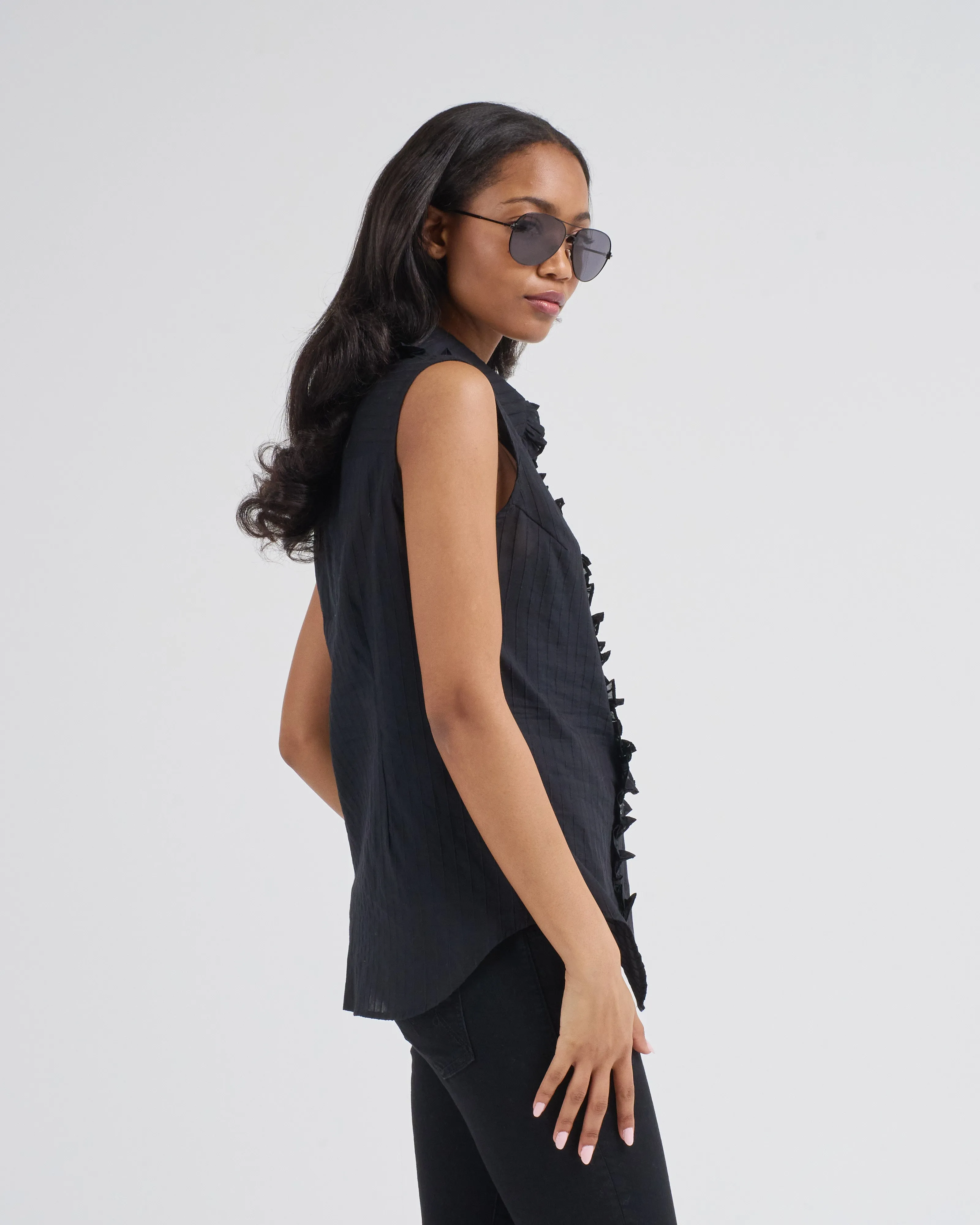 sleeveless ruffle trim shirt