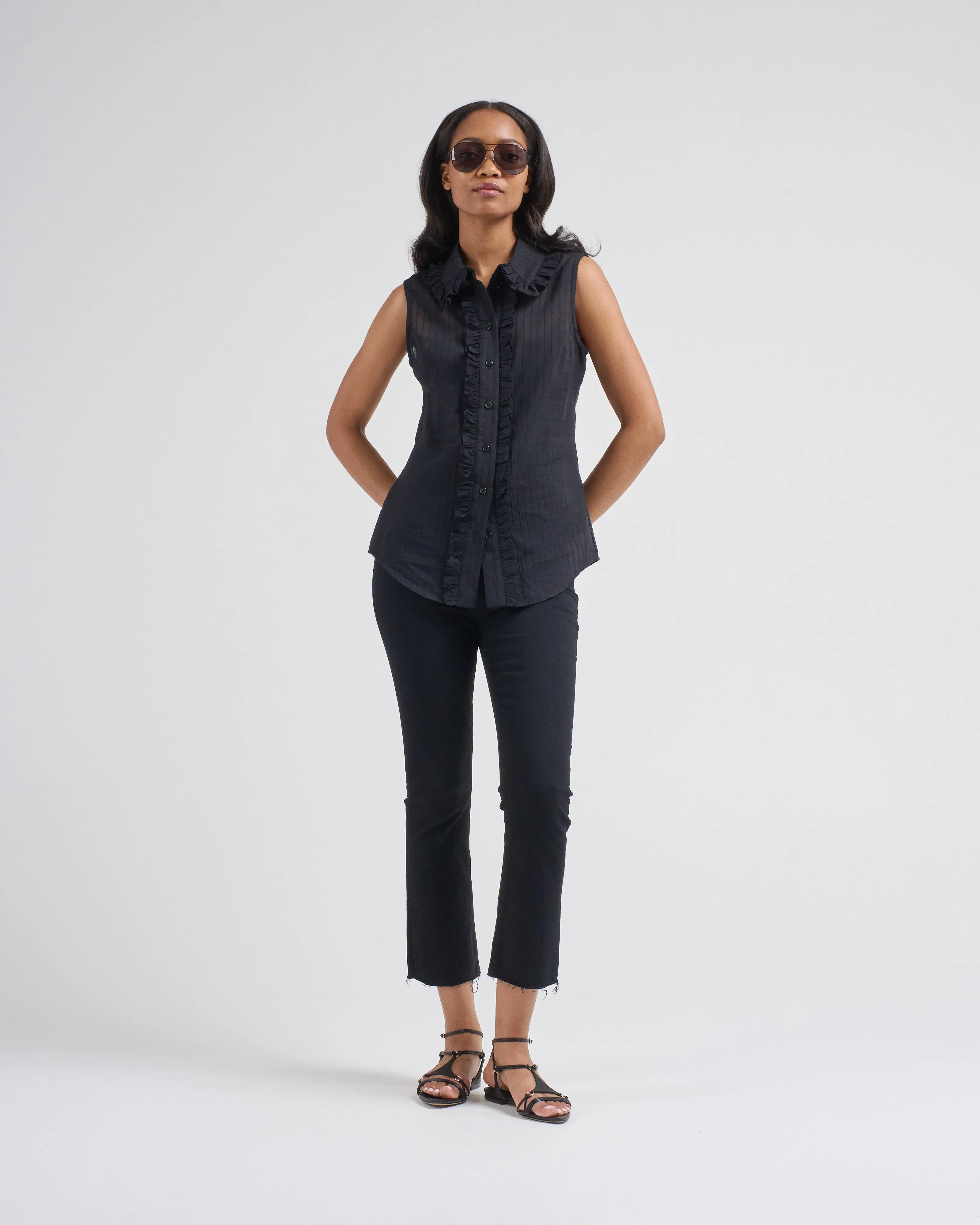 sleeveless ruffle trim shirt