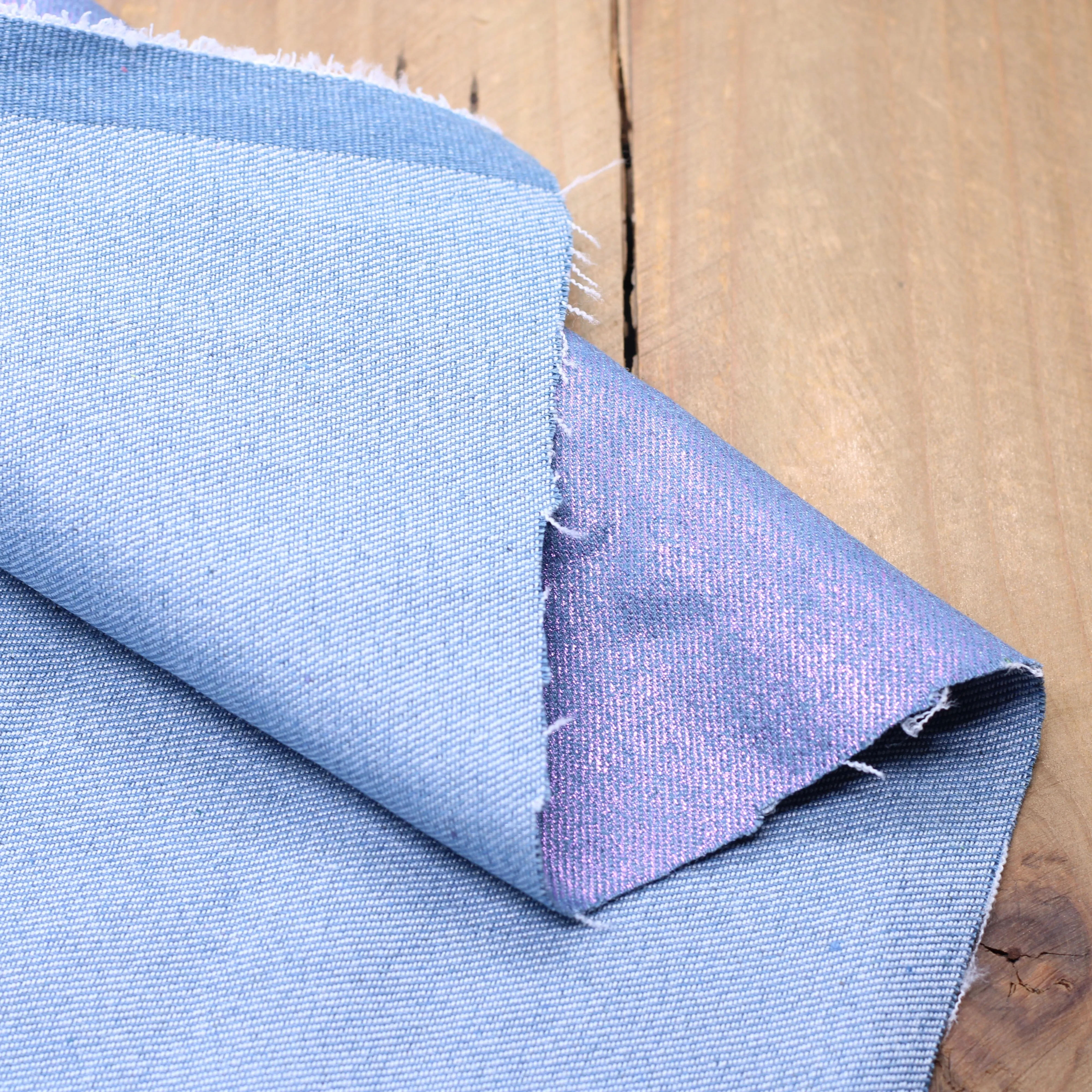 Tissu Jean Stretch- Bleu moyen irisé rose (Vendu x10cm)